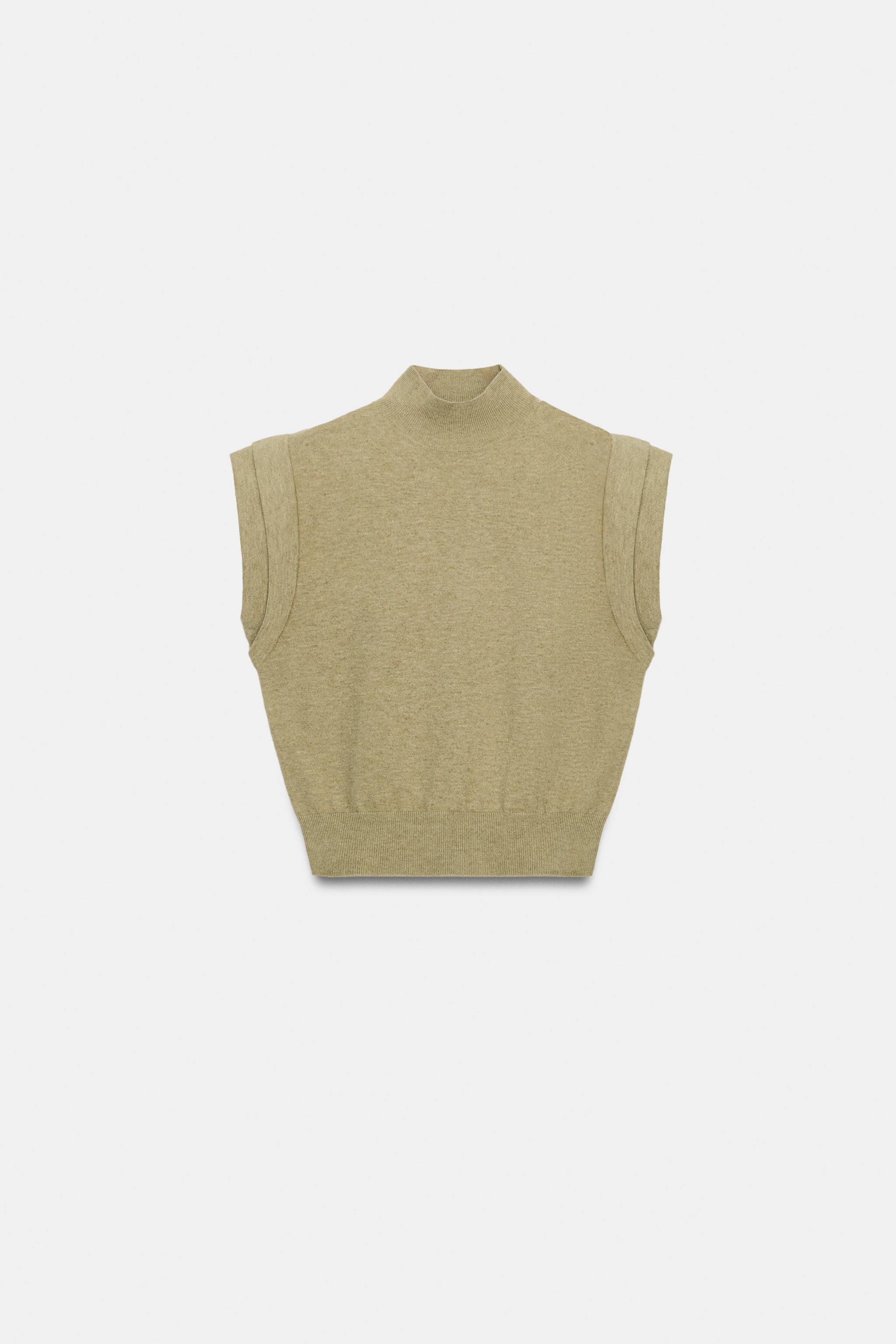 TOP EN MAILLE AVEC ÉPAULES MARQUÉES